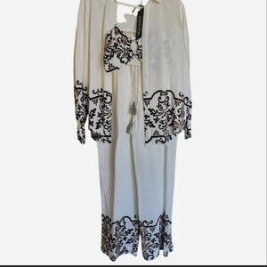 NWT 3 piece set. white long sleeve top and matching pants with Matching Bra